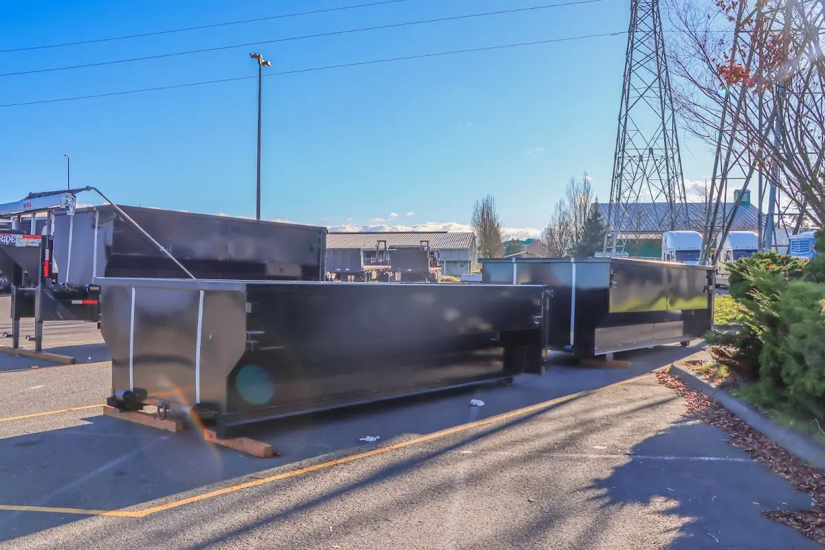 Roll-off dumpster ready for waste disposal at job site for Construction Dumpster Rental in Great Neck Plaza
